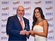 31 March 2023; Maria O'Neill of Ulster University receives her Yoplait All-Stars award from Ladies HEC chairperson Daniel Caldwell at the 2022 Yoplait HEC All Stars evening, at the Dublin Bonnington Hotel in Dublin. Photo by Piaras Ó Mídheach/Sportsfile