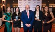 31 March 2023; Ladies HEC chairperson Daniel Caldwell with ATU Sligo players, from left, Deirbhaile Lynch, Lily Vickers, Róisín Rodgers with their Yoplait Rising Stars awards alongside Ciara McGarvey of ATU Donegal with her Yoplait All-Star award at the 2022 Yoplait HEC All-Stars & Rising Stars evening at the Dublin Bonnington Hotel in Dublin. Photo by Piaras Ó Mídheach/Sportsfile