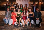 31 March 2023; DCU Dóchas Éireann winners, back row from left, Laoise Lenehan, Molly Carthy, Robyn Murray, Claire Dunne and Róisín Ennis and front row, from left, Tara Needham, Anna Rose Kennedy, Clodagh Lohan and Kate Kenny withStephen Duff, front left, Colm Canning, front right, Áine McParland, back left, and Peter Clarke, back right, at the 2022 Yoplait HEC All-Stars & Rising Stars evening at the Dublin Bonnington Hotel in Dublin. Photo by Piaras Ó Mídheach/Sportsfile