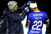 31 March 2023; Giles Phillips of Waterford receives medical attention during the SSE Airtricity Men's First Division match between Waterford and Finn Harps at RSC in Waterford. Photo by Michael P Ryan/Sportsfile