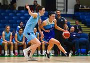 1 April 2023; Mia Furlong of The Address UCC Glanmire in action against Rachel Huijsdens of DCU Mercy during the MissQuote.ie Champions Trophy Final match between The Address UCC Glanmire, Cork and DCU Mercy, Dublin at National Basketball Arena in Tallaght, Dublin. Photo by Ben McShane/Sportsfile