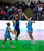 1 April 2023; Khiarica Rasheed of The Address UCC Glanmire scores a basket despite Rachel Huijsdens of DCU Mercy, right, during the MissQuote.ie Champions Trophy Final match between The Address UCC Glanmire, Cork and DCU Mercy, Dublin at National Basketball Arena in Tallaght, Dublin. Photo by Ben McShane/Sportsfile