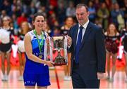 1 April 2023; The Address UCC Glanmire captain Áine McKenna is presented the cup by Basketball Ireland CEO John Feehan after the MissQuote.ie Champions Trophy Final match between The Address UCC Glanmire, Cork and DCU Mercy, Dublin at National Basketball Arena in Tallaght, Dublin. Photo by Ben McShane/Sportsfile