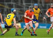 1 April 2023; Paudie Lappin of Armagh in action against Roscommon Darragh Finn, left, and Mark Ward during the Allianz Hurling League Division 3A Final match between Roscommon and Armagh at Páirc Tailteann in Navan, Meath. Photo by Michael P Ryan/Sportsfile