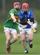 1 April 2023; Liam Og Cooke of Cavan in action against Paul Lenehan of Leitrim during the Allianz Hurling League Division 3B Final match between Cavan and Leitrim at GAA National Games Development Centre in Sport Ireland Campus in Dublin. Photo by David Fitzgerald/Sportsfile