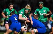 1 April 2023; Sam Monaghan of Ireland is tackled by Agathe Sochat and Audrey Forlani of France during the TikTok Women's Six Nations Rugby Championship match between Ireland and France at Musgrave Park in Cork. Photo by Brendan Moran/Sportsfile