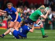 1 April 2023; Sam Monaghan of Ireland is tackled by Charlotte Escudero of France during the TikTok Women's Six Nations Rugby Championship match between Ireland and France at Musgrave Park in Cork. Photo by Brendan Moran/Sportsfile