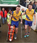 1 April 2023; Eoin Fitzgerald of Roscommon, left, makes his way back out after been stretchered off to join in the celebrations after the Allianz Hurling League Division 3A Final match between Roscommon and Armagh at Páirc Tailteann in Navan, Meath. Photo by Michael P Ryan/Sportsfile