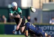 1 April 2023; Mack Hansen of Connacht is tackled by Ignacio Brex of Benetton during the Challenge Cup Round of 16 match between Benetton and Connacht at Stadio Monigo in Treviso, Italy. Photo by Roberto Bregani/Sportsfile