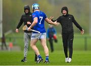 1 April 2023; Cavan supporters run on to congratulate Matthew Hynes after the Allianz Hurling League Division 3B Final match between Cavan and Leitrim at GAA National Games Development Centre in Sport Ireland Campus in Dublin. Photo by David Fitzgerald/Sportsfile