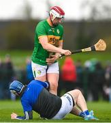 1 April 2023; Darren Sheridan of Cavan and Conor Beirne of Leitrim tussle during the Allianz Hurling League Division 3B Final match between Cavan and Leitrim at GAA National Games Development Centre in Sport Ireland Campus in Dublin. Photo by David Fitzgerald/Sportsfile