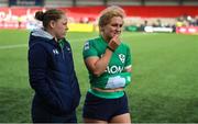 1 April 2023; Neve Jones of Ireland, right, and teammate Nicole Cronin leave the pitch after the TikTok Women's Six Nations Rugby Championship match between Ireland and France at Musgrave Park in Cork. Photo by Brendan Moran/Sportsfile