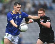 1 April 2023; Eoin Darcy of Wicklow in action against Evan Lyons of Sligo during the Allianz Football League Division 4 Final match between Sligo and Wicklow at Croke Park in Dublin. Photo by Piaras Ó Mídheach/Sportsfile