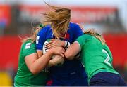 1 April 2023; Gaelle Hermet of France is tackled by Dorothy Wall and Neve Jones of Ireland during the TikTok Women's Six Nations Rugby Championship match between Ireland and France at Musgrave Park in Cork. Photo by Brendan Moran/Sportsfile