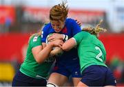 1 April 2023; Gaelle Hermet of France is tackled by Dorothy Wall and Neve Jones of Ireland during the TikTok Women's Six Nations Rugby Championship match between Ireland and France at Musgrave Park in Cork. Photo by Brendan Moran/Sportsfile