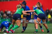 1 April 2023; Charlotte Escudero of France is tackled by Dorothy Wall and Emma Swords of Ireland during the TikTok Women's Six Nations Rugby Championship match between Ireland and France at Musgrave Park in Cork. Photo by Brendan Moran/Sportsfile