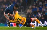 1 April 2023; Jimmy O'Brien of Leinster is tackled by James Hume of Ulster  during the Heineken Champions Cup Round of 16 match between Leinster and Ulster at the Aviva Stadium in Dublin. Photo by Harry Murphy/Sportsfile
