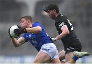 1 April 2023; Darragh Fitzgerald of Wicklow in action against Luke Towey of Sligo during the Allianz Football League Division 4 Final match between Sligo and Wicklow at Croke Park in Dublin. Photo by Tyler Miller/Sportsfile