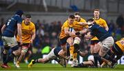 1 April 2023; Mike Lowry of Ulster is tackled by Hugo Keenan and Andrew Porter of Leinster during the Heineken Champions Cup Round of 16 match between Leinster and Ulster at Aviva Stadium in Dublin. Photo by Sam Barnes/Sportsfile