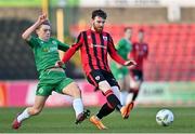 1 April 2023; Gary Armstrong of Longford Town in action against Ronan Teehan of Kerry FC during the SSE Airtricity Men's First Division match between Longford Town and Kerry at Bishopsgate in Longford. Photo by Stephen Marken/Sportsfile