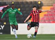 1 April 2023; Joshua Giurgi of Longford Town scores his side's first goal during the SSE Airtricity Men's First Division match between Longford Town and Kerry at Bishopsgate in Longford also pictured Kevin Williams of Kerry FC. Photo by Stephen Marken/Sportsfile