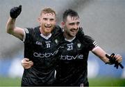 1 April 2023; Sligo players Seán Carrabine, left, and Mikey Gordon celebrate after their side's victory after the Allianz Football League Division 4 Final match between Sligo and Wicklow at Croke Park in Dublin. Photo by John Sheridan/Sportsfile