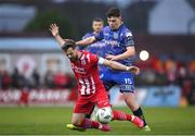 1 April 2023; Greg Bolger of Sligo Rovers is fouled by James Clarke of Bohemians during the SSE Airtricity Men's Premier Division match between Sligo Rovers and Bohemians at The Showgrounds in Sligo. Photo by Seb Daly/Sportsfile