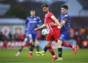 1 April 2023; Greg Bolger of Sligo Rovers is fouled by James Clarke of Bohemians during the SSE Airtricity Men's Premier Division match between Sligo Rovers and Bohemians at The Showgrounds in Sligo. Photo by Seb Daly/Sportsfile