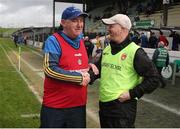 1 April 2023; Roscommon manager Seamus Qualter, left, shakes hands with Armagh manager Karl McKeegan after the Allianz Hurling League Division 3A Final match between Roscommon and Armagh at Páirc Tailteann in Navan, Meath. Photo by Michael P Ryan/Sportsfile