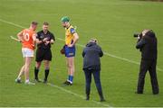 1 April 2023; Referee James Connors performs the coin toss with Roscommon captain Brendan Mulry, right, and Armagh captain Fionntán Donnelly before the Allianz Hurling League Division 3A Final match between Roscommon and Armagh at Páirc Tailteann in Navan, Meath. Photo by Michael P Ryan/Sportsfile