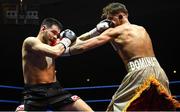 1 April 2023; Edward Donovan, right, in action against Frank Madsen during their super welterweight bout at the National Stadium in Dublin. Photo by David Fitzgerald/Sportsfile