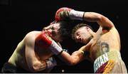 1 April 2023; Edward Donovan, right, in action against Frank Madsen during their super welterweight bout at the National Stadium in Dublin. Photo by David Fitzgerald/Sportsfile