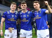 1 April 2023; Cavan players, from left, Donal Conlon, Mark Walsh and Mikey Gordon celebrate after their side's victory in the Allianz Football League Division 3 Final match between Cavan and Fermanagh at Croke Park in Dublin. Photo by John Sheridan/Sportsfile
