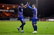 1 April 2023; Jonathan Afolabi, left, and Ali Coote of Bohemians celebrates their side's first goal, scored by teammate Krystian Nowak, not pictured, during the SSE Airtricity Men's Premier Division match between Sligo Rovers and Bohemians at The Showgrounds in Sligo. Photo by Seb Daly/Sportsfile