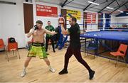 1 April 2023; Jason Quigley warming up with his trainer Rodger Lee before his super middleweight bout at the National Stadium in Dublin. Photo by David Fitzgerald/Sportsfile
