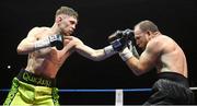 1 April 2023; Jason Quigley, left, in action against Gabor Gorbics during their super middleweight bout at the National Stadium in Dublin. Photo by David Fitzgerald/Sportsfile