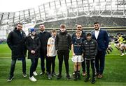1 April 2023; Match day mascot Leo Geraghty and family with Leinster players, from left, Rónan Kelleher, Charlie Ngatai and Vakhtang Abdaladze at the Heineken Champions Cup Round of 16 match between Leinster and Ulster at Aviva Stadium in Dublin. Photo by Harry Murphy/Sportsfile