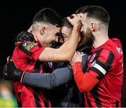 1 April 2023; Joshua Giurgi of Longford Town, left celebrates scoring his side's second goal with goalkeeper Jack Brady and captain Shane Elworthy during the SSE Airtricity Men's First Division match between Longford Town and Kerry at Bishopsgate in Longford. Photo by Stephen Marken/Sportsfile