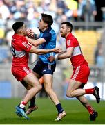 2 April 2023; Michael Fitzsimons of Dublin in action against Ben McCarron, left, and Niall Loughlin of Derry during the Allianz Football League Division 2 Final match between Dublin and Derry at Croke Park in Dublin. Photo by Sam Barnes/Sportsfile