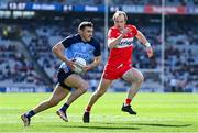 2 April 2023; Colm Basquel of Dublin in action against Padraig Cassidy of Derry during the Allianz Football League Division 2 Final match between Dublin and Derry at Croke Park in Dublin. Photo by Ramsey Cardy/Sportsfile