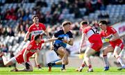 2 April 2023; Seán Bugler of Dublin in action against Derry players, from left, Gareth McKinless, Ethan Doherty and Paul Cassidy during the Allianz Football League Division 2 Final match between Dublin and Derry at Croke Park in Dublin. Photo by Ramsey Cardy/Sportsfile