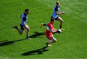 2 April 2023; Gareth McKinless of Derry in action against Colm Basquel, left, and Cian Murphy of Dublin during the Allianz Football League Division 2 Final match between Dublin and Derry at Croke Park in Dublin. Photo by Tyler Miller/Sportsfile