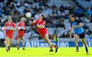 2 April 2023; Conor McCluskey of Derry in action against Colm Basquel of Dublin during the Allianz Football League Division 2 Final match between Dublin and Derry at Croke Park in Dublin. Photo by Ramsey Cardy/Sportsfile