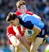 2 April 2023; Michael Fitzsimons of Dublin is tackled by Lachlan Murray of Derry during the Allianz Football League Division 2 Final match between Dublin and Derry at Croke Park in Dublin. Photo by Ramsey Cardy/Sportsfile