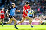 2 April 2023; Paul Cassidy of Derry in action against Lee Gannon of Dublin during the Allianz Football League Division 2 Final match between Dublin and Derry at Croke Park in Dublin. Photo by Ramsey Cardy/Sportsfile