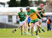 2 April 2023; Danny Cullen of Donegal in action against Jack Regan of Meath during the Allianz Hurling League Division 2B Final match between Meath and Donegal at Avant Money Páirc Seán Mac Diarmada in Carrick-on-Shannon, Leitrim. Photo by Stephen Marken/Sportsfile