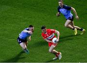 2 April 2023; Shea Downey of Derry in action against John Small of Dublin during the Allianz Football League Division 2 Final match between Dublin and Derry at Croke Park in Dublin. Photo by Tyler Miller/Sportsfile