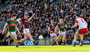 2 April 2023; Johnny Heaney of Galway shoots at goal under pressure from Mayo goalkeeper Colm Reape and Conor Loftus of Mayo during the Allianz Football League Division 1 Final match between Galway and Mayo at Croke Park in Dublin. Photo by Ramsey Cardy/Sportsfile