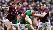 2 April 2023; Conor Loftus of Mayo in action against John Maher, left, and Matthew Tierney of Galway during the Allianz Football League Division 1 Final match between Galway and Mayo at Croke Park in Dublin. Photo by Sam Barnes/Sportsfile