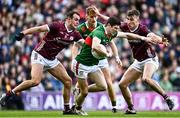 2 April 2023; Conor Loftus of Mayo in action against John Maher, left, and Matthew Tierney of Galway during the Allianz Football League Division 1 Final match between Galway and Mayo at Croke Park in Dublin. Photo by Sam Barnes/Sportsfile